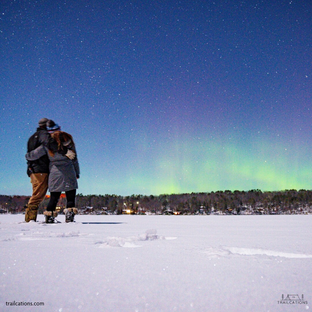 Watching the northern lights show on the frozen lakes of Minnesota's north woods.
