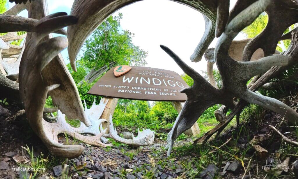 Isle Royale Windigo welcome sign. Many years of moose antler sheds are gathered at the docks here.